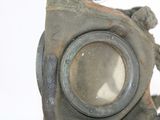a gas mask with a hole in the middle of it