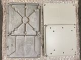 a picture of a metal box that has a lid on it