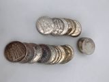 a lot of coins that are on the table