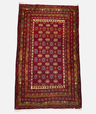 a red rug with a floral design on a white background