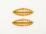 deux barrettes dorées ornées de feuilles