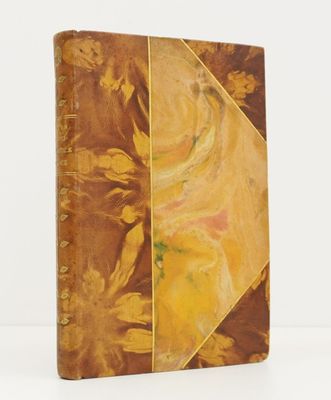 an old book with a painting on it sitting on top of a table