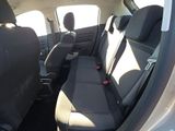 the back seats of a car are empty with no one in it