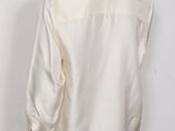 an image of a mannequin mannequin wearing a white shirt