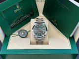 a rolex watch and a rolex watch in a box