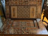 a wooden table with a drawer on top of it