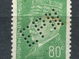 an old stamp with a picture of a man wearing a hat