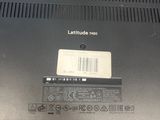 a close up of a laptop with a label on it