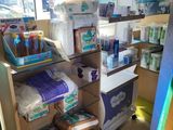 a store with a lot of items on the shelves