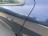 a close up of a car ' s door handle and door handle