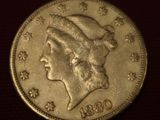 an image of a gold coin with a woman ' s head on it