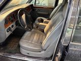 an image of a car with a leather seat and dashboard