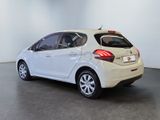 a picture of a white car parked in a room