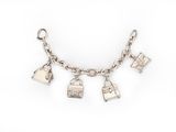 a close up of a silver bracelet with charms on it