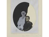 a black and white photo of a man and a woman in front of a full moon