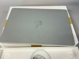 a box with an apple laptop on top of it