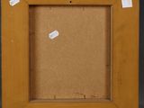 an old picture frame with a piece of paper taped to it