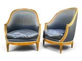 pair of blue upholstered armchairs with wood frame and upholstered seat