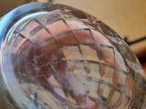 a close up of a glass jar on a table