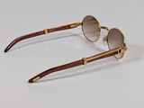 the pair of sunglasses is made of wood and metal