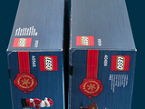 two boxes of lego christmas ornaments on a table