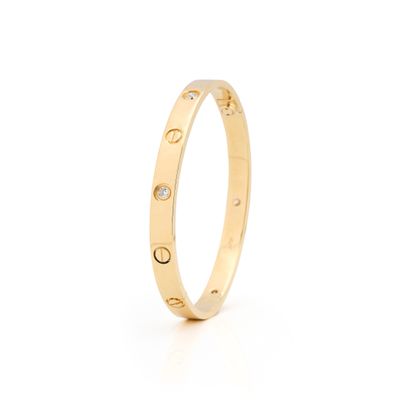 Bague Cartier Love en or jaune 18 carats sertie de diamants