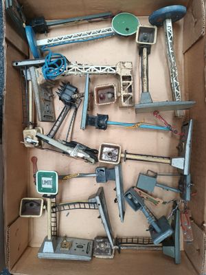 a cardboard box filled with assorted construction tools