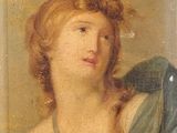 portrait d'une jeune femme portant un châle vert