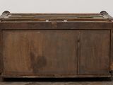 a wooden box with a glass top on a wooden floor