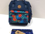 a blue and orange backpack with a tag on it next to a blue and orange bag
