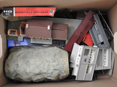 a cardboard box filled with assorted items in it