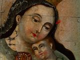 painting of a woman with a crown holding a child