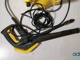a yellow and black blower sitting on a white table