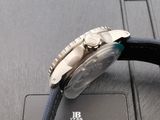 a watch that is sitting on top of a black case