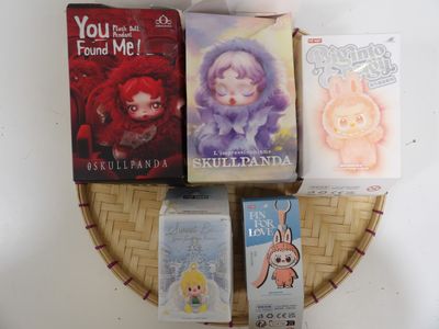 many children ' s books on a wicker basket on the table
