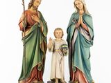 three figurines of jesus and mary with a child