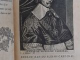 an open book with a picture of a man in a priest ' s robes