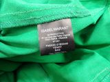 a close up of a label on a green jacket