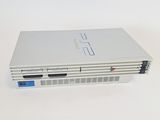 an image of a white laptop computer sitting on top of a white table