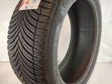 a close up of a tire on a white surface