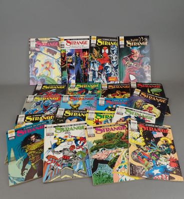 a collection of comic books on a table
