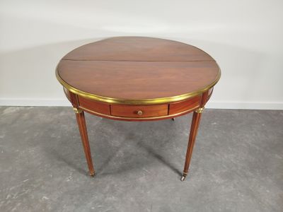 Table de salle à manger ronde à système d'allonge, en acajou…