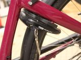 a close up of a bike with a chain attached to it