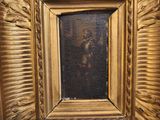 une image d'un tableau dans un cadre doré