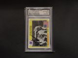 a close up of a baseball card on a black surface