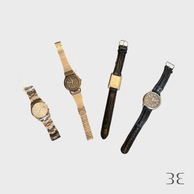 trois montres différentes posées les unes à côté des autres sur une surface blanche
