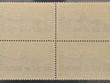 an old postage stamp with four squares on it