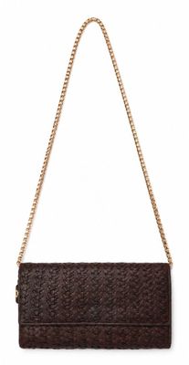 a close up of a brown purse on a white background
