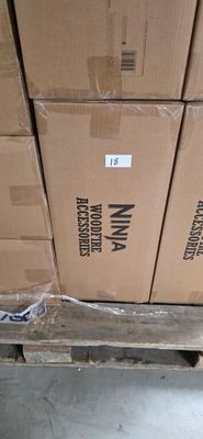 many boxes stacked on a pallet in a warehouse