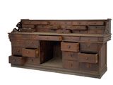 an old wooden desk with drawers and drawers on it